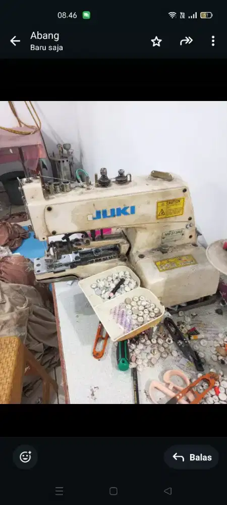 mesin pasang kancing juki