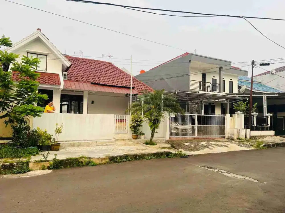 Jual rumah siap huni.harga miring. Taman Yasmin sektor 2.