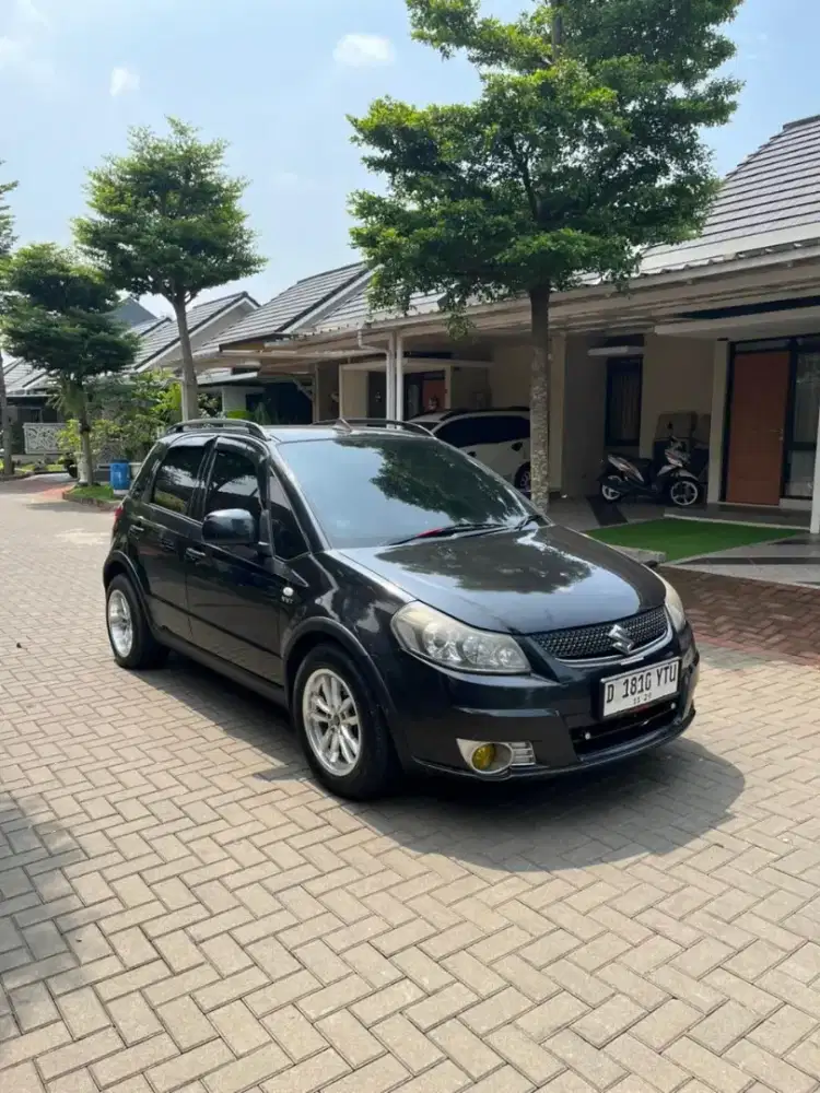 DP 5 JT | SX4 X OVER 2010 MANUAL