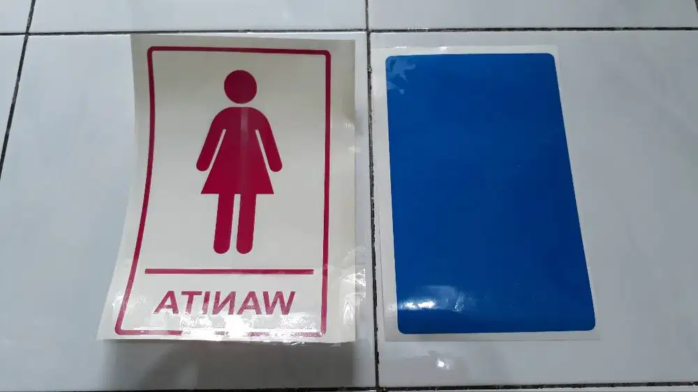 Cutting sticker logo tulisan stiker nama neon box reklame kaca film