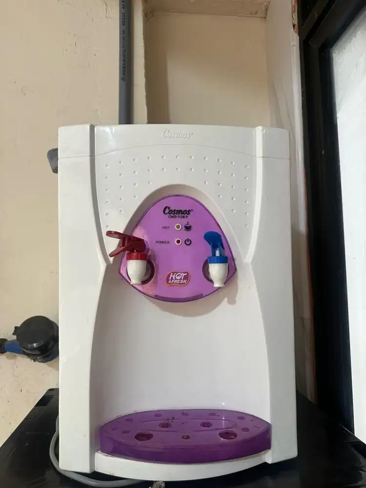 Dispenser panas dan normal cosmos