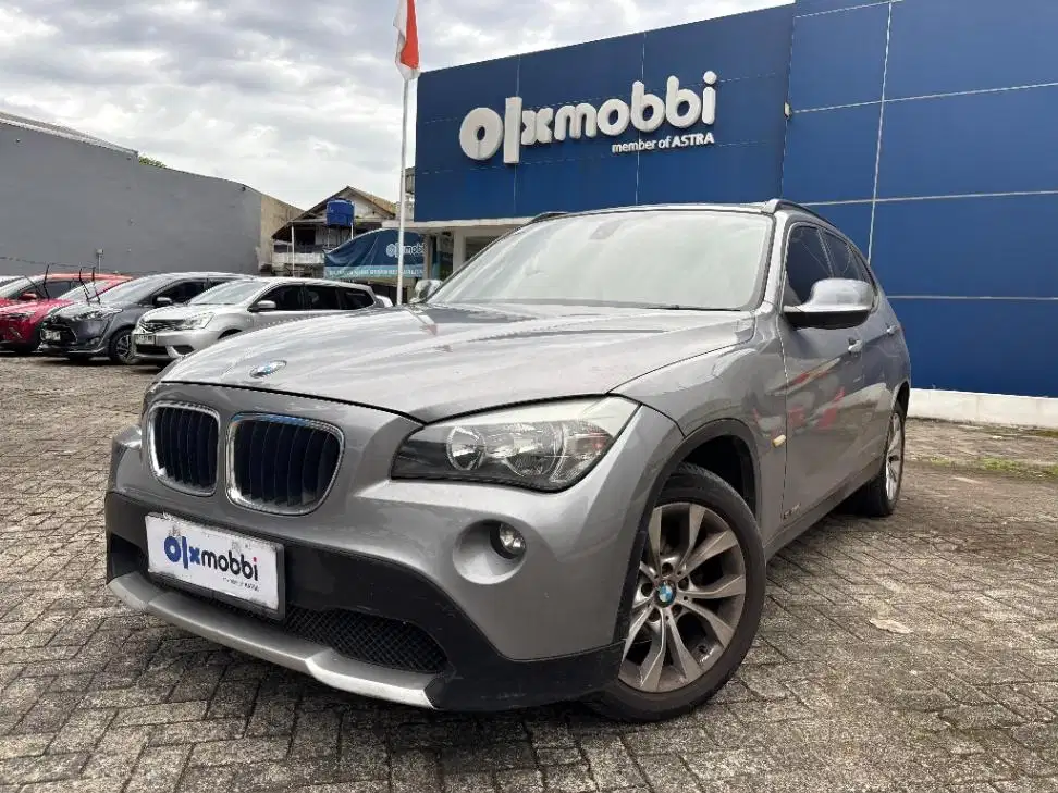 BMW X1 2.0 sDrive18i Bensin-AT 2011 Abu-Abu