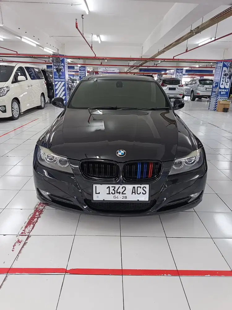 BMW 320i 2011 Bensin
