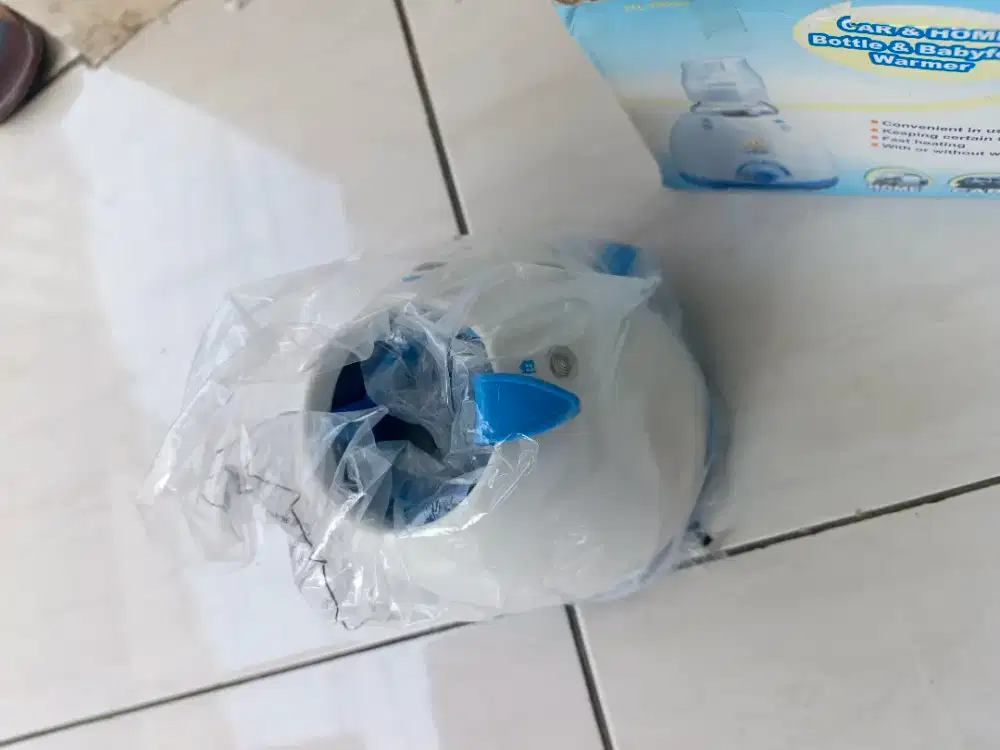 Alat Penghangat botol susu
