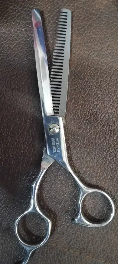 Gunting potong rambut