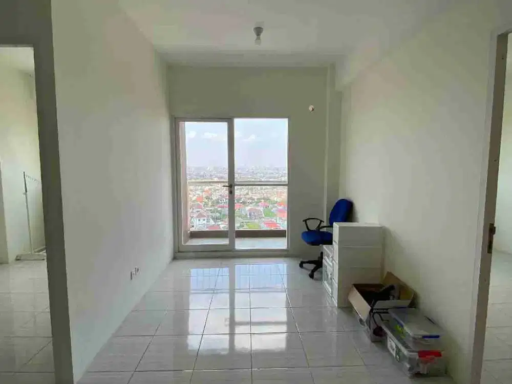 SEWA APARTEMEN PUNCAK DHARMAHUSADA SEMI FURNISHED LUAS 56M2
