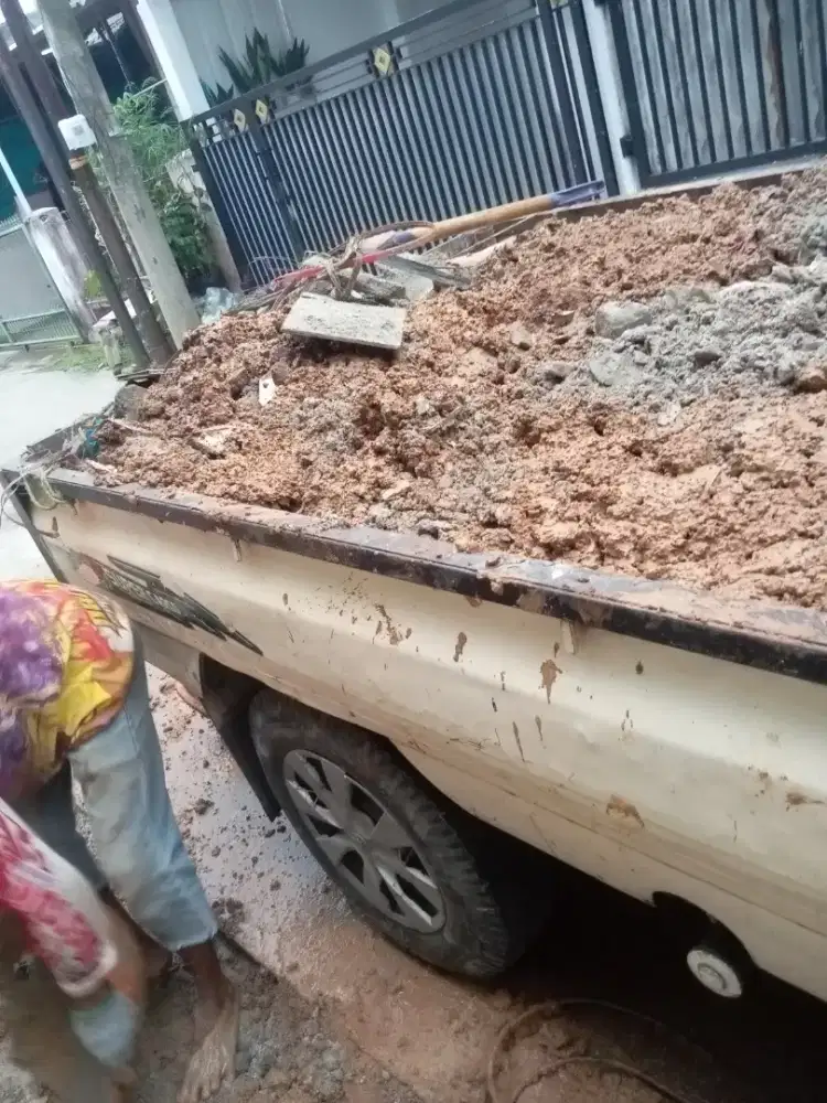 buang puing dan bersih bersih