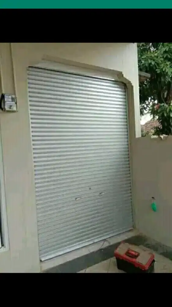Rolling door folding gate