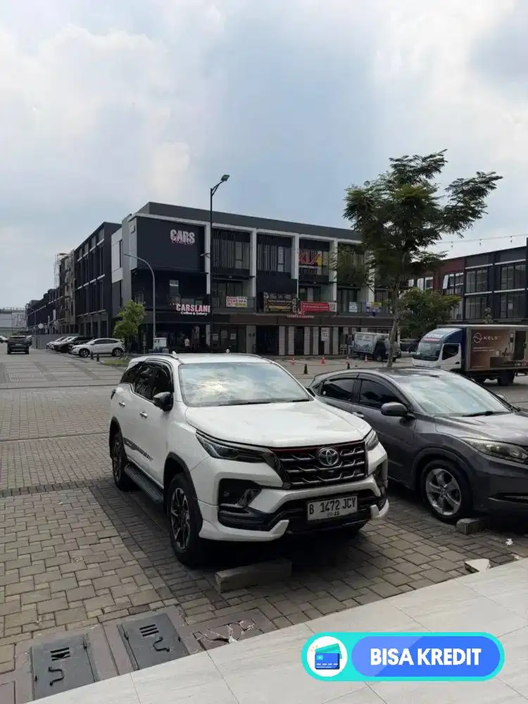 Fortuner trd bibir merah
