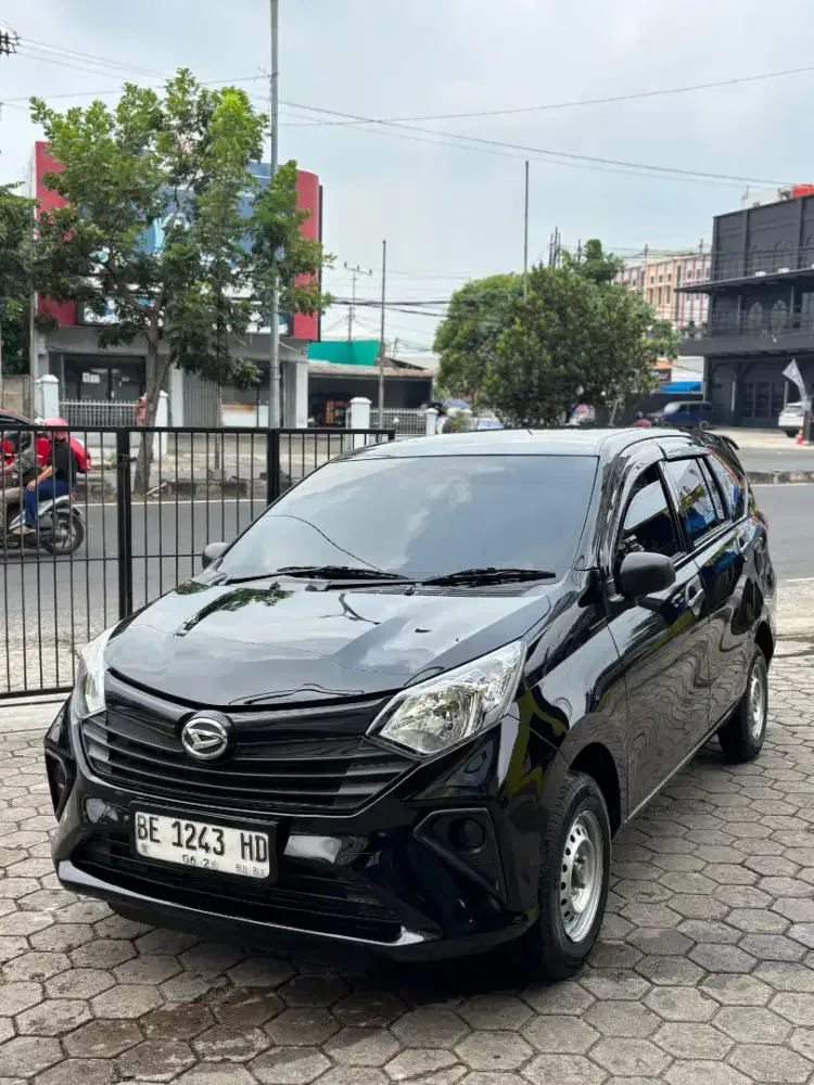 Sigra D MT 2023