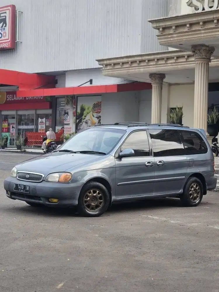 Kia Carnival 2.5 L Bensin A/T 2000 Sunroof kondisi sangat terawat low