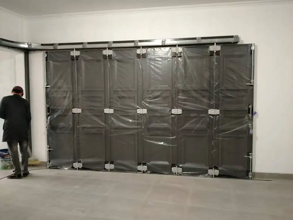 Pintu Ruko model henderson sliding / tikung harga per meter