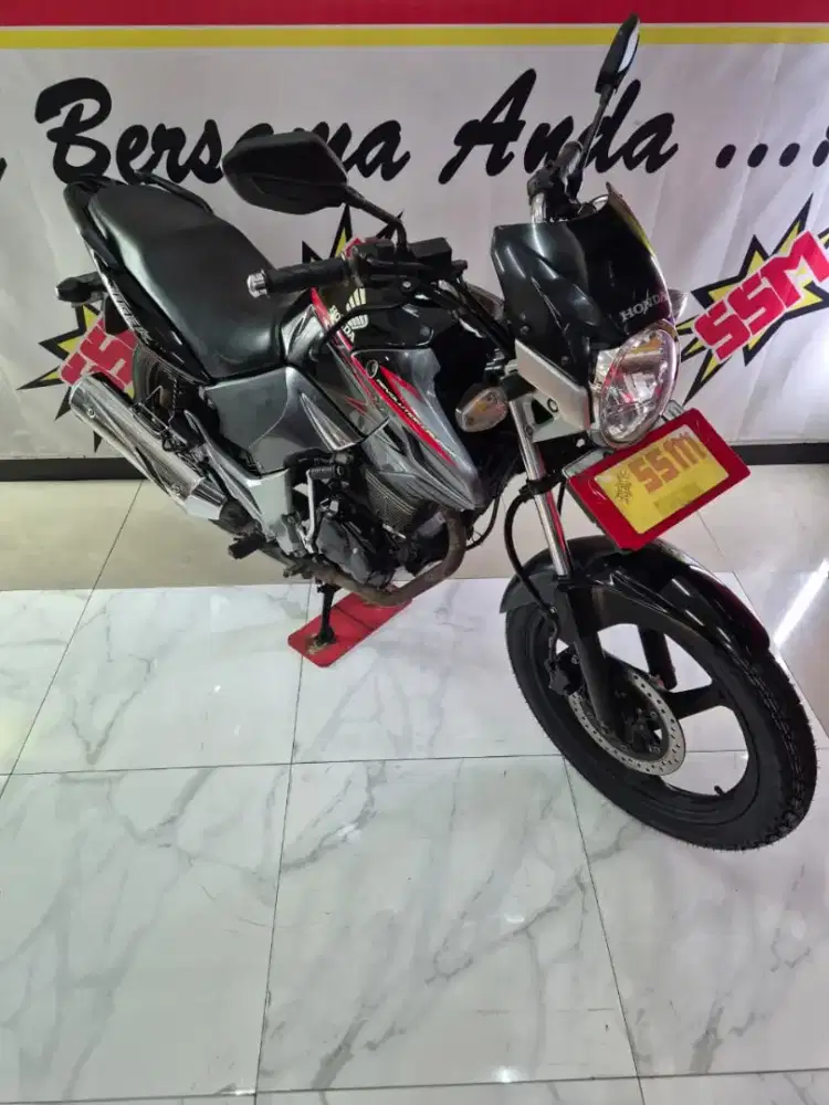 Tiger Revo cw karbu 2013 plat L,