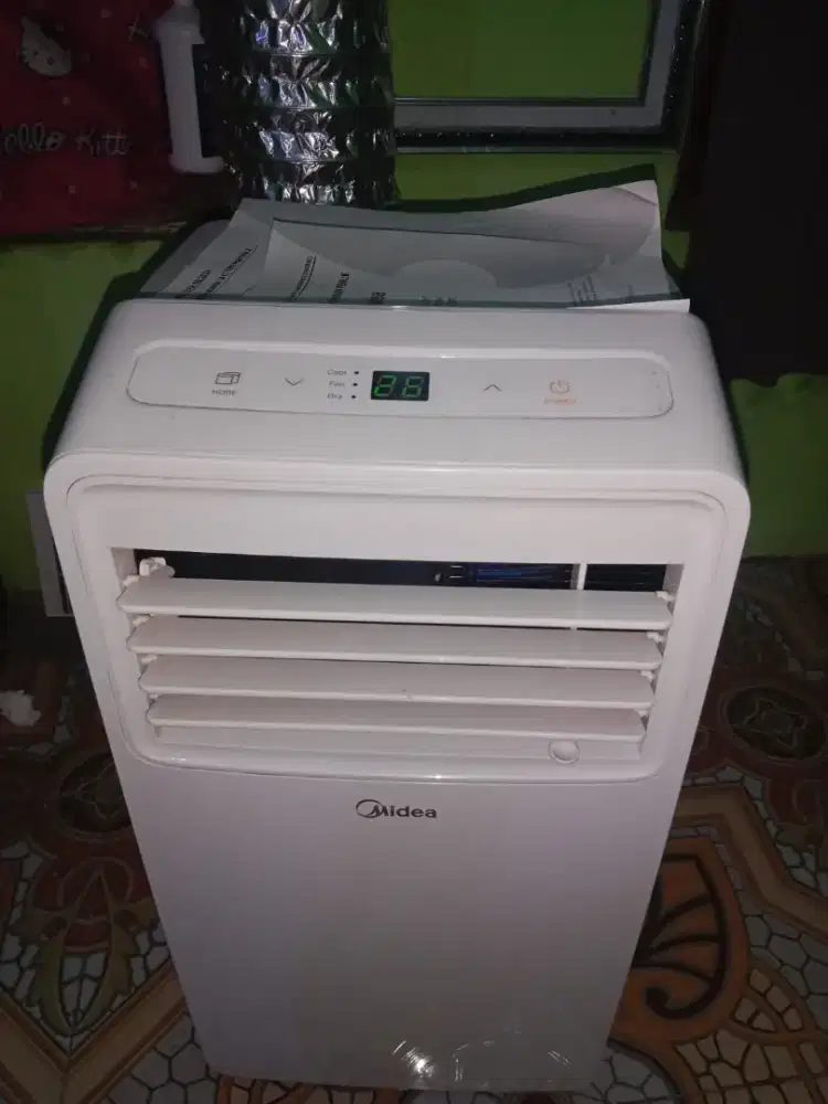 AC PORTABLE MIDEA 1/2 PK