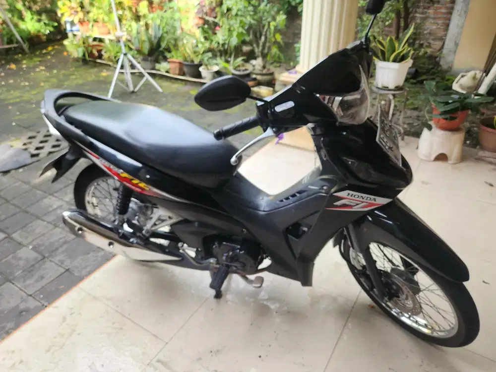 Revo f1 hitam 2021 dp100rb gbm