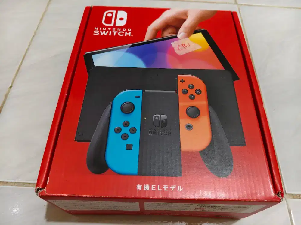 Nintendo switch OLED warna strip merah - biru