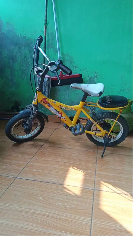 sepeda anak uk 12 warna kuning