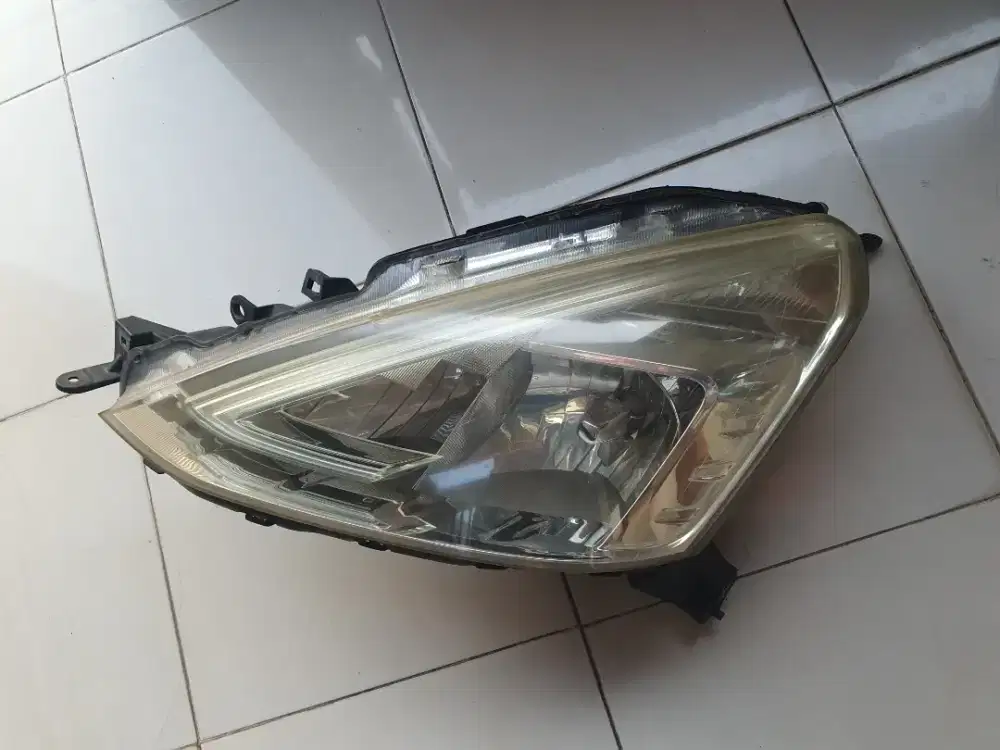 Head lamp grand livina L11