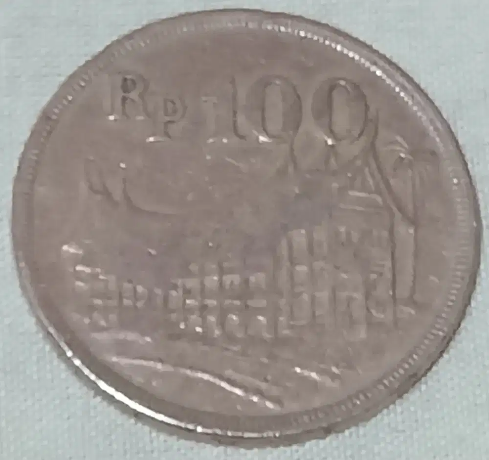 Koin kuno Rp100 tebal besar th 1973 Rumah Gadang Simpanan