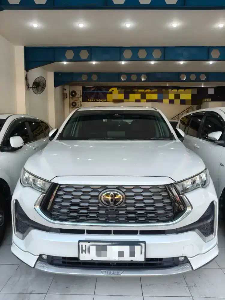 Toyota Innova Zenix Q Hybrid Modellista 2023 Matic Putih  Favorit