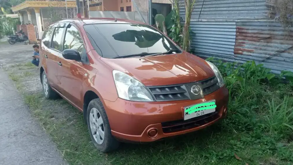 Grand livina nissan oranye metalic