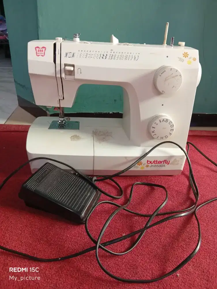 Mesin jahit bekas portable buterclg jh8530A