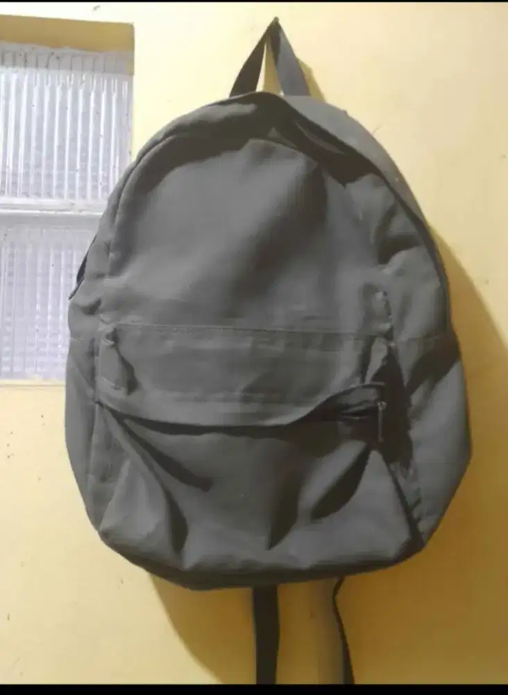 Tas backpack warna grey muat untuk laptop