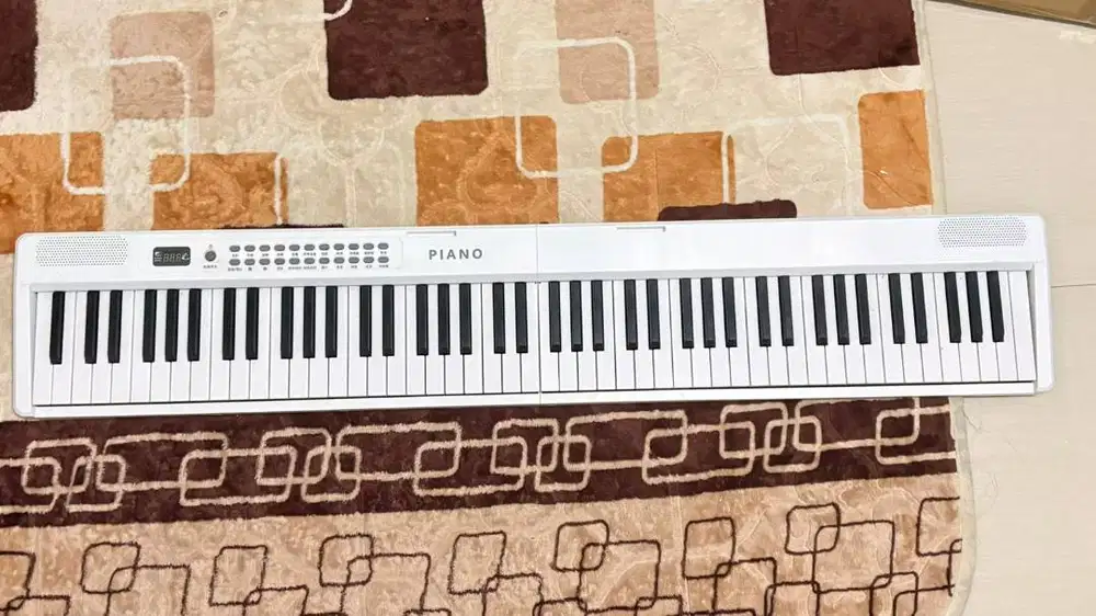 Keyboard Elektrik Lipat 88 tuts Portabel Charging - Pemula