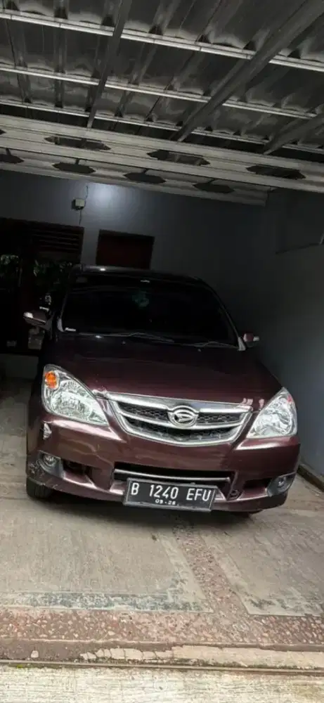 Xenia 2011 manual merah metalik
