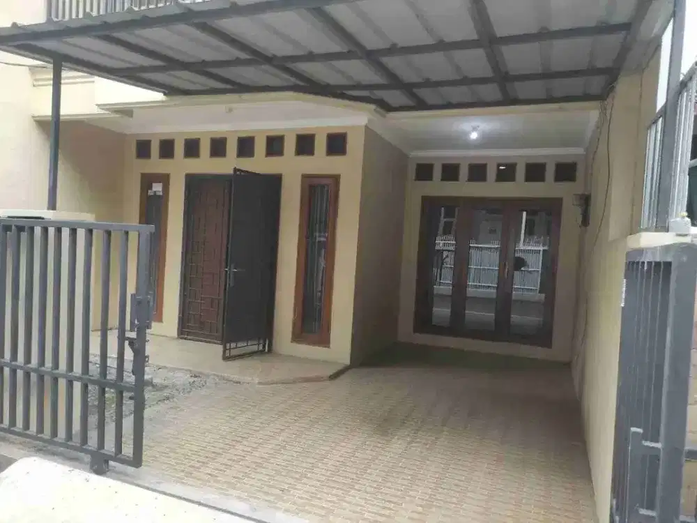 Rumah 2 lantai siap huni murah di pondok kelapa LT 90 LB 150 dmt tol becak kayu