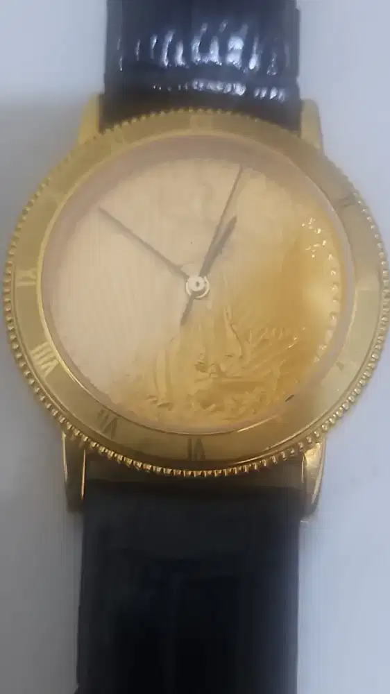 Jam tangan koin dolar lapis emas