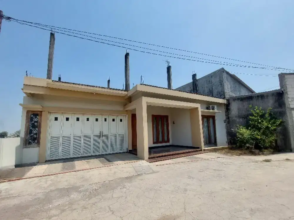 rumah mewah dan toko gudang pinggir jalan raya jaten