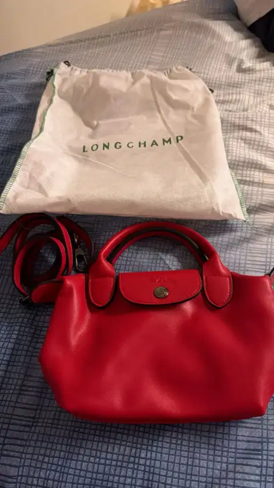 Tas longchamp mini red punya artis