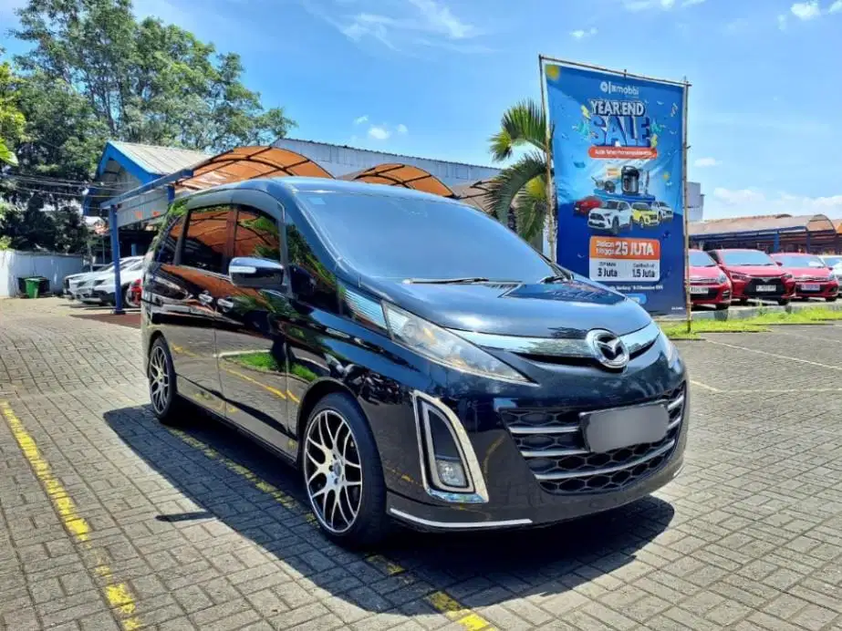 LOW DP - Mazda Biante 2.0 Bensin-AT 2013