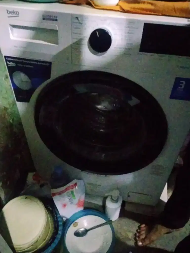 Mesin cuci dan alat pengering