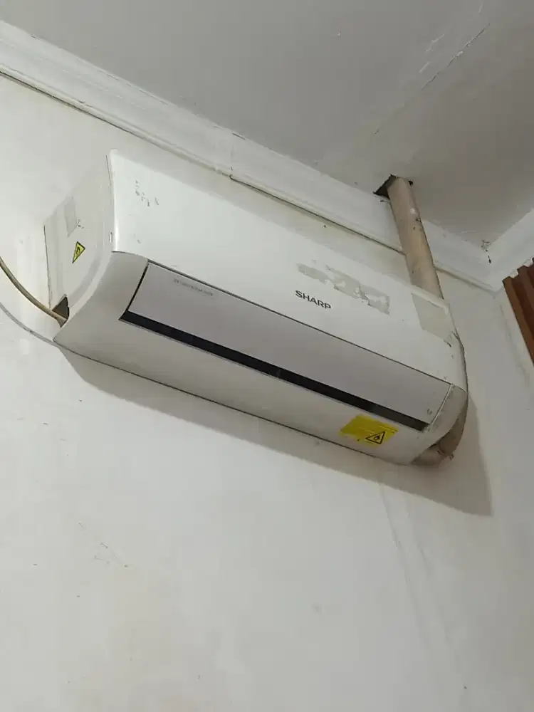 Di jual aja AC Sharp setengah PK