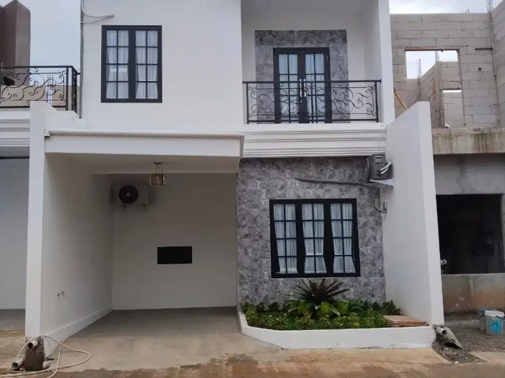 DIJUAL RUMAH MODERN 3 MENIT ST LRT HARJAMUKTI BEBAS BANJIR SHM