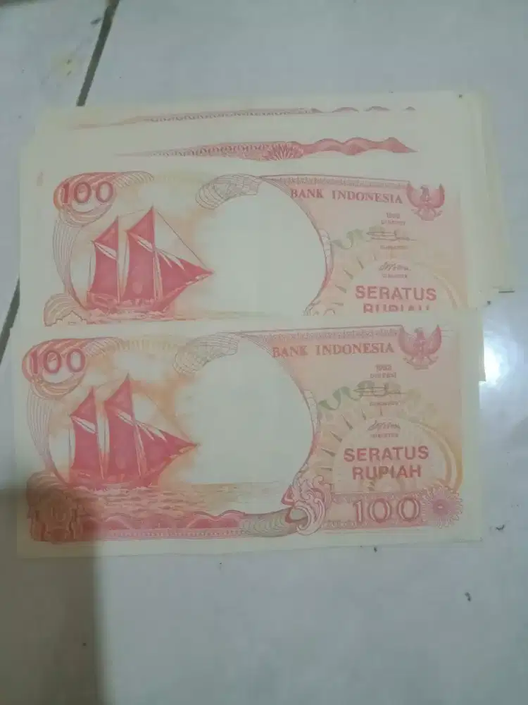 Uang 100 rupiah gambar perahu pinisi