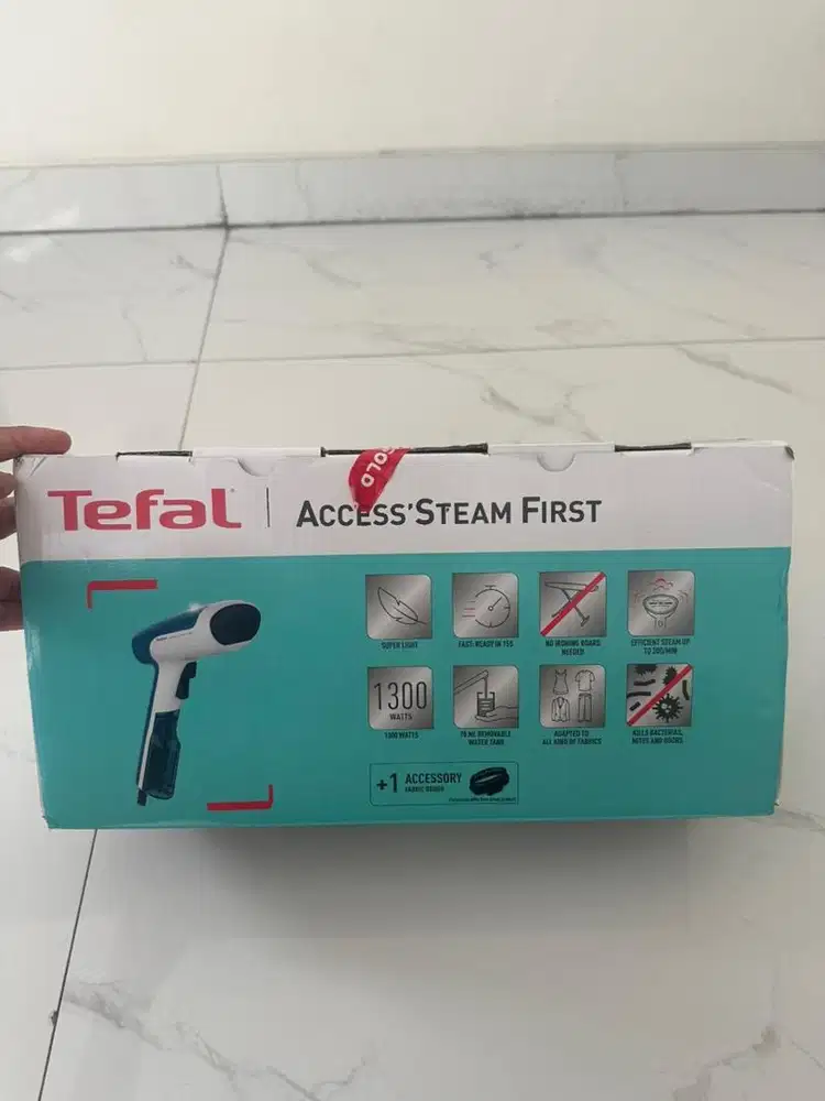 Setrika uap merk Tefal