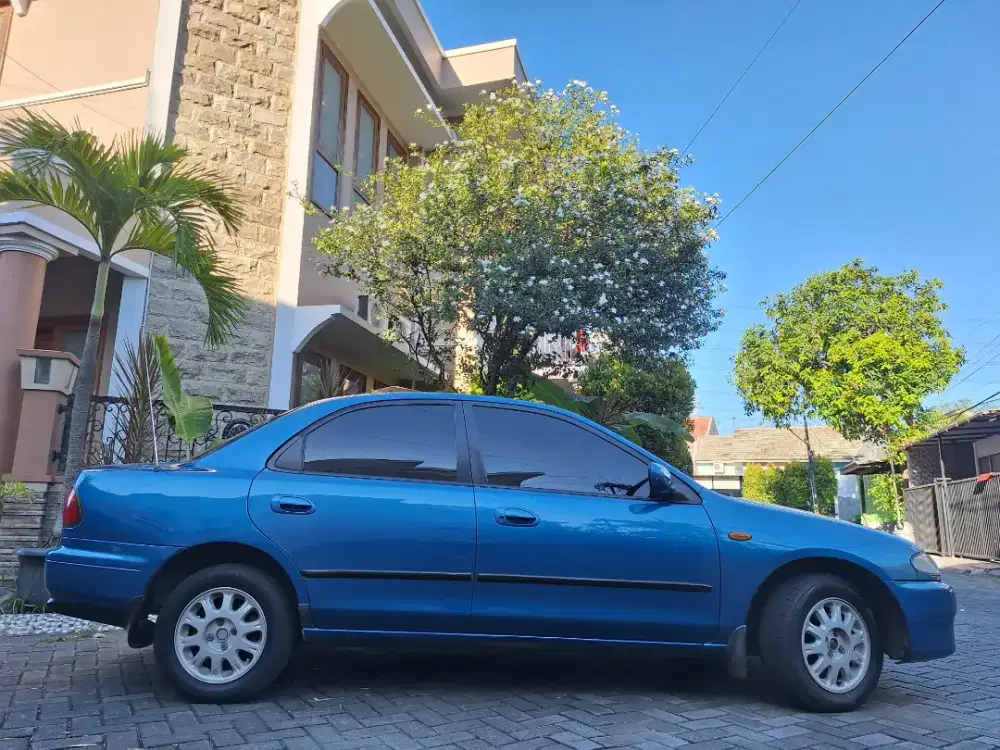 CASH ISTIMEWA Mazda 323 LANTIS Familia Interplay 1996