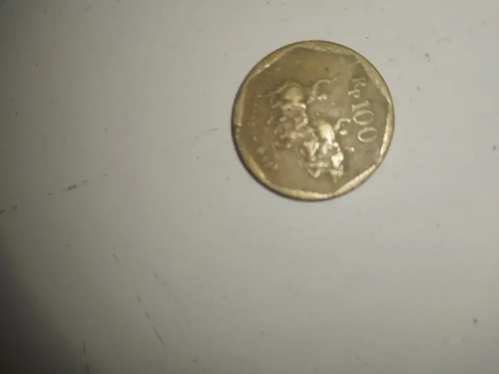 Koin 100 rupiah kuning