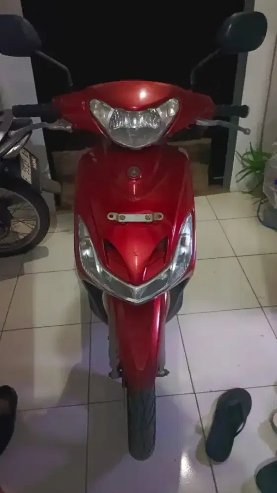 Mio smile 2011 merah marun i