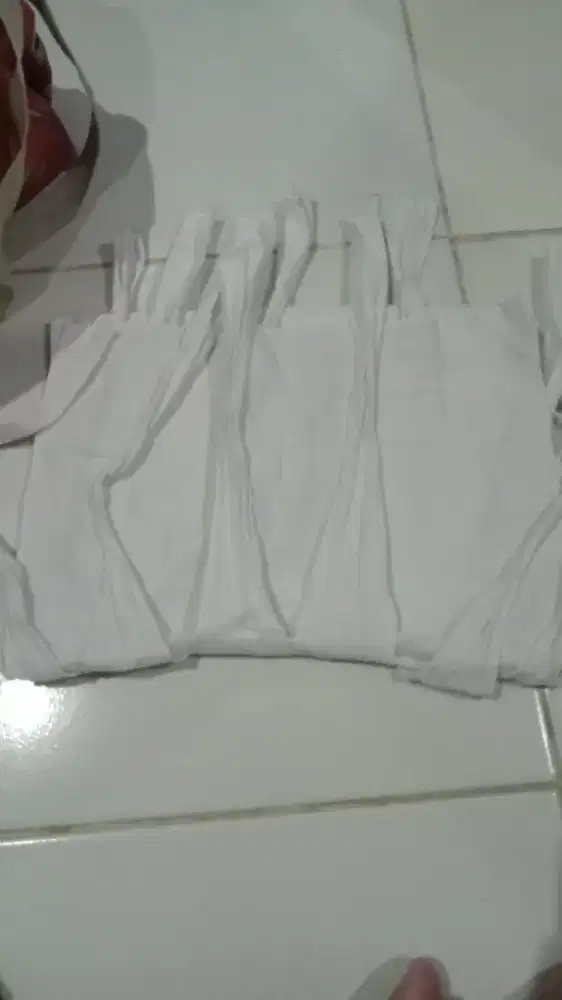 Baju bayi dan gurita ibu
