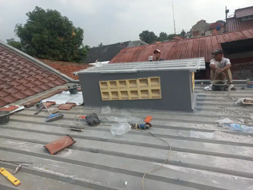 Tukang perbaikan atap bocor,dag,talang,kanopi,renopasi dll
