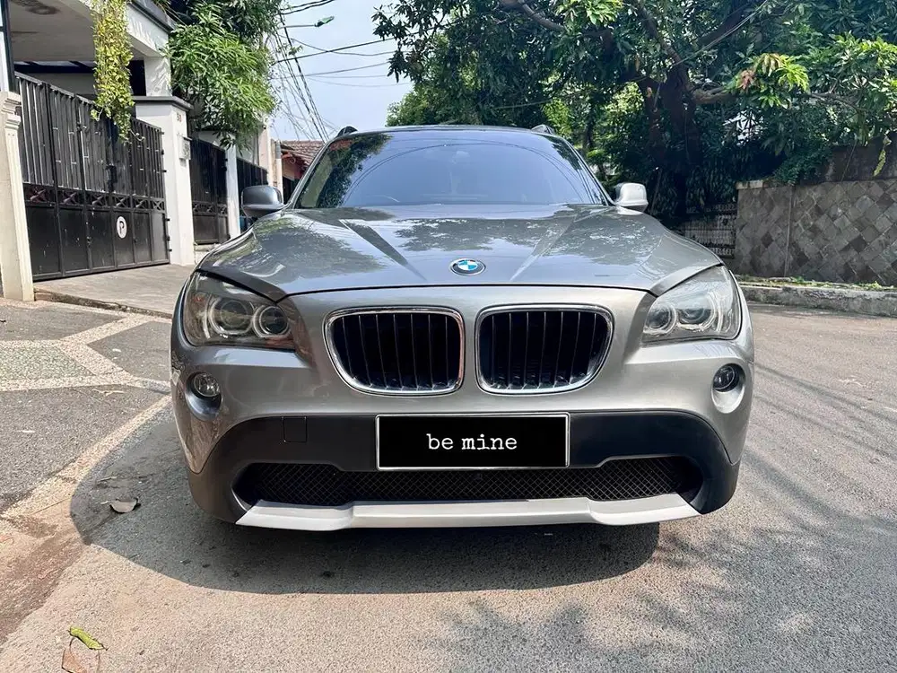 Bmw x1 e84 sdrive18i at abu metalik 2012 pribadi orisinil nego cash