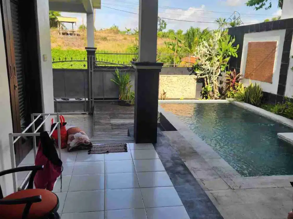 VILLA LANTAI II DENGAN PEMANDANGAN SAWAH