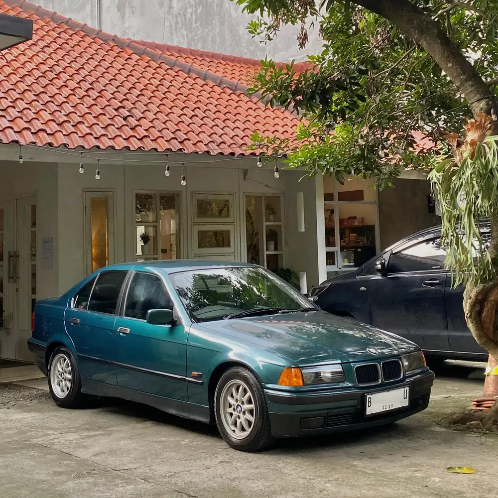 BMW 320i 1994 Bensin