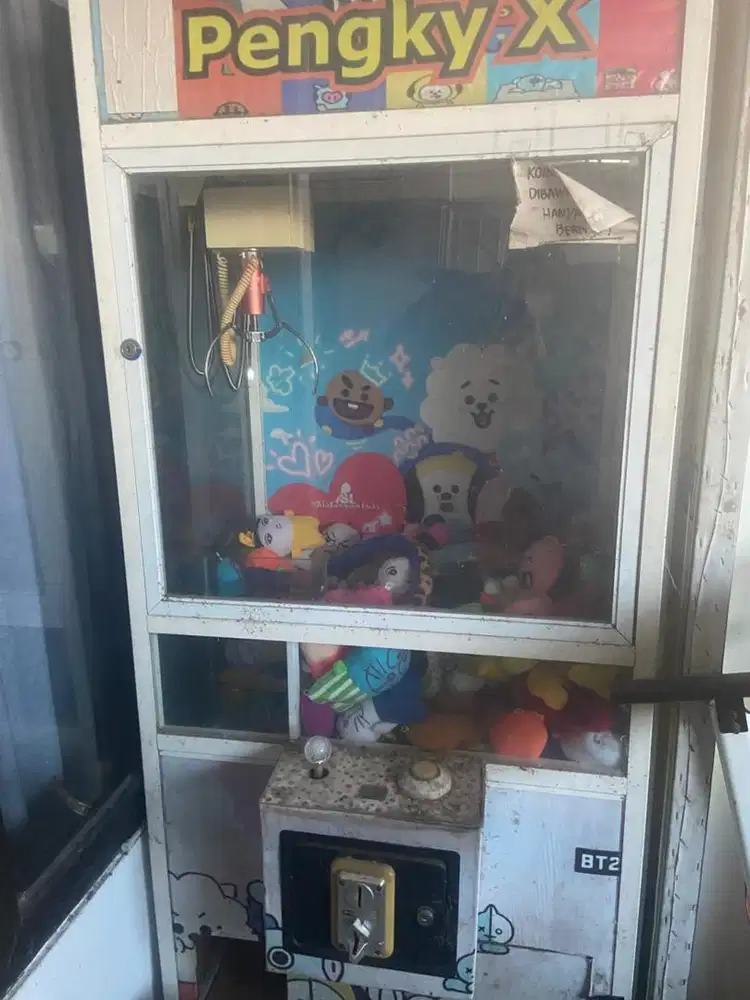 Mainan ambil boneka