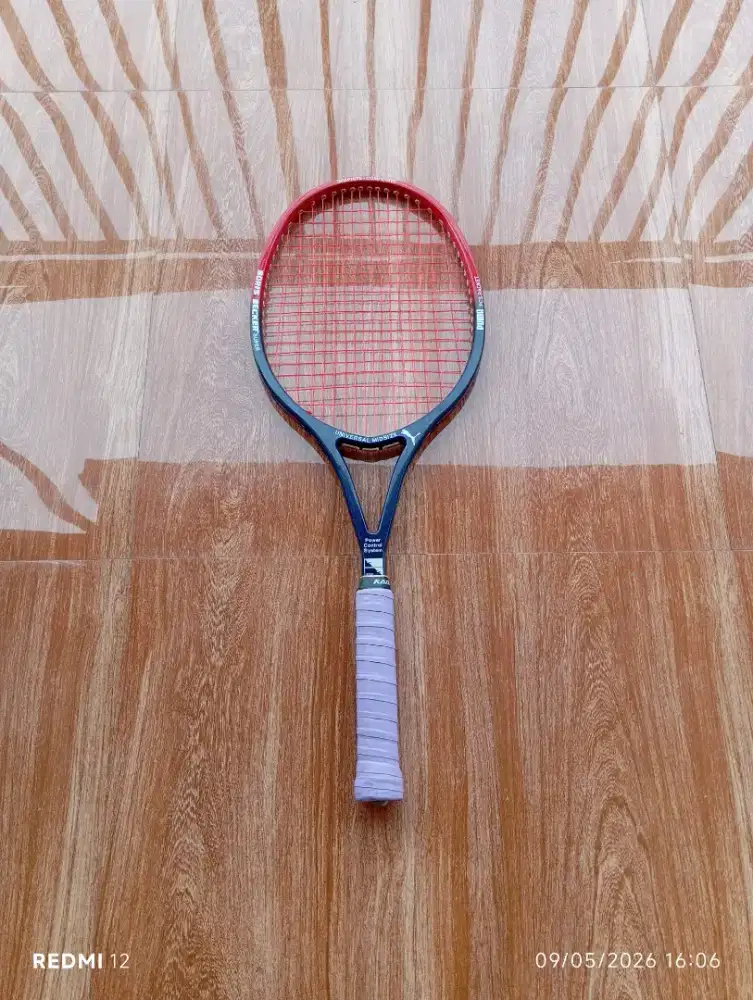 raket tenis bekas puma