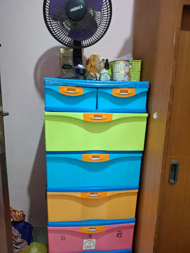 Laci baju lion star gratis kipas angin